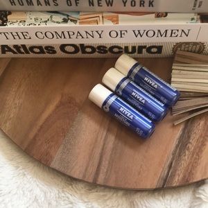 Set of three unopened Nivea Kiss Moisture Lip Balm